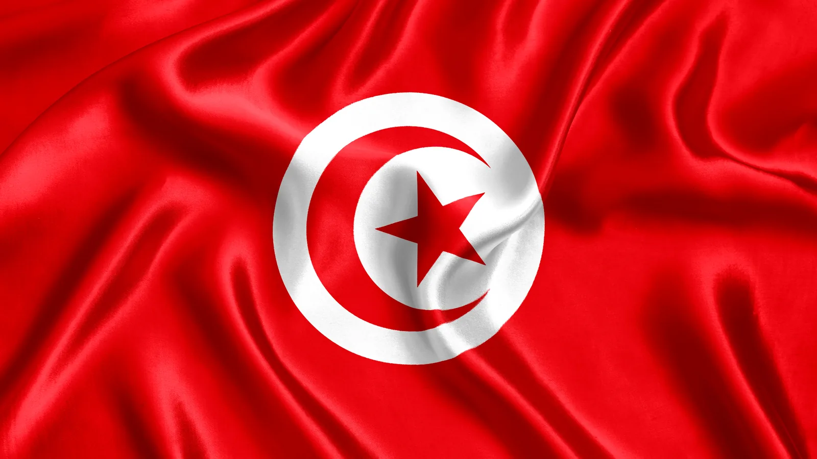 Drapeau de la Tunisie, disque blanc portant un croissant et une étoile rouges sur fond rouge