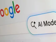 Bouton AI Mode affiché sous le logo Google sur la page du moteur de recherche